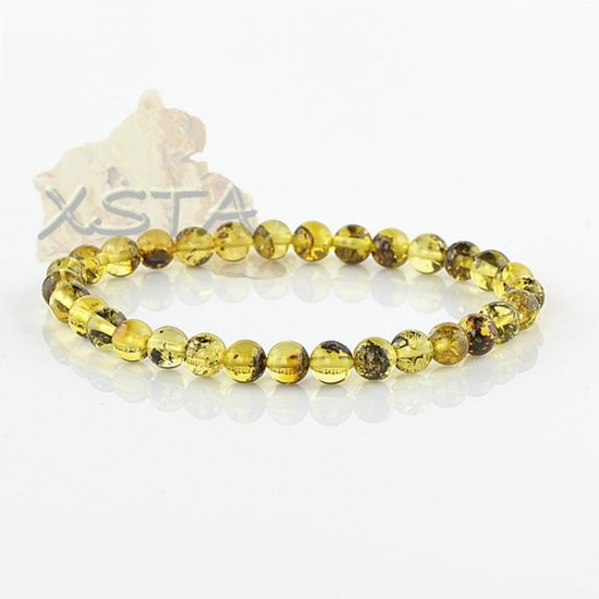 Medium green round amber bracelet